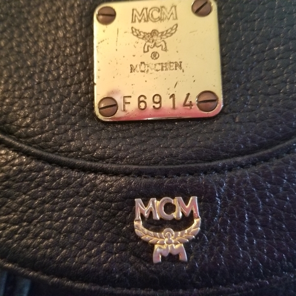Authentic MCM Studded Black Leather Backpack in excellent used condition. - Picture 11 of 16